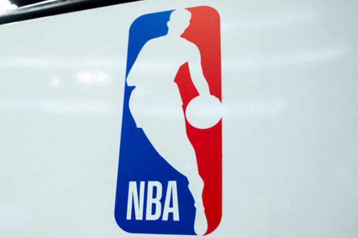 NBA logo featuring a silhouette of a basketball player dribbling, with "NBA" text below