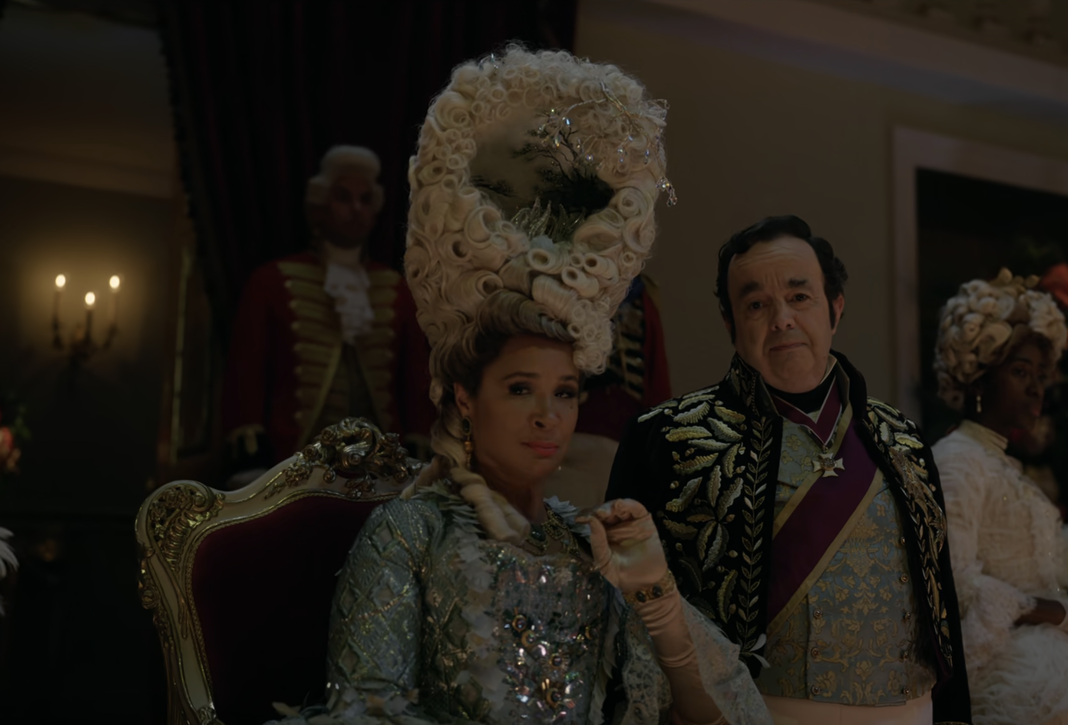 Queen Charlotte wearing an ornate wig and gown