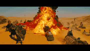 Scene from "Mad Max: Fury Road," showing an intense chase with vehicles and a large explosion. Characters including Max Rockatansky and Furiosa in action
