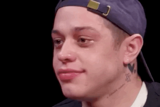 Pete Davidson holds in his laughter