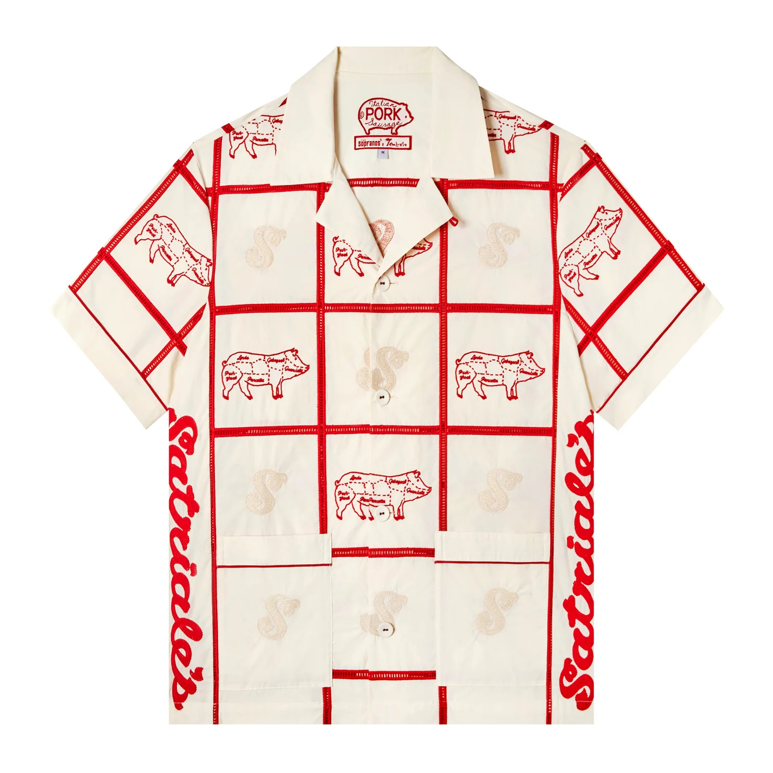 A short-sleeved button-down shirt featuring a pattern of pigs and a grid design. The shirt also has the word &quot;Satriale&#x27;s&quot; written on the sleeves