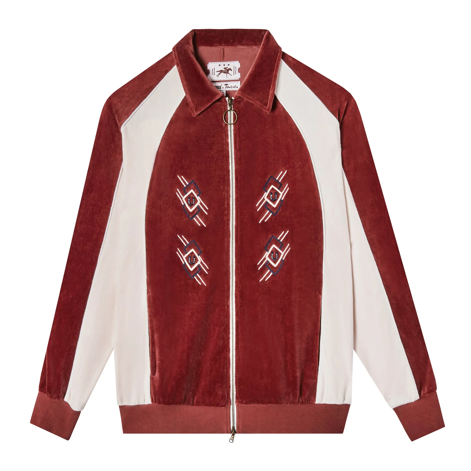 A vintage-style jacket with a zip-up front, featuring a red velvet body with light-colored panels and geometric embroidery on the chest