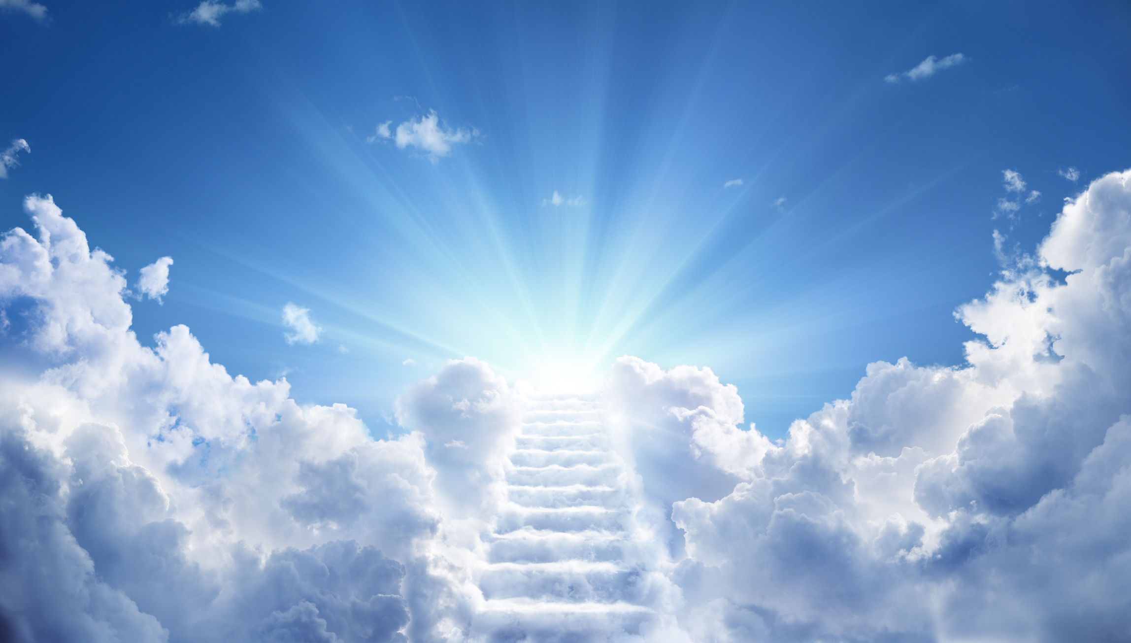 A staircase made of clouds ascends towards a bright light in a blue sky, with rays of light shining through the clouds