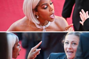 Kelly Rowland, in an elegant dress, and Ursula Meier engage in an animated conversation on a red carpet. Both appear expressive and intense