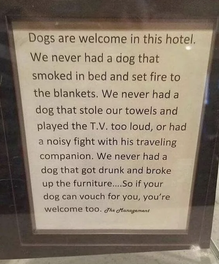 Hotel sign stating dogs are welcome because they don't cause disturbances. Ends with "So if your dog can vouch for you, you’re welcome too. -The Management."