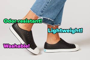 Black slip-on shoes with white soles are shown being worn with cuffed blue jeans. Text highlights features: "Odor-resistant!", "Lightweight!", and "Washable!"