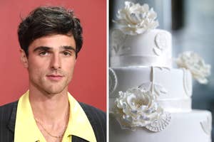 Jacob Elordi poses in a black pinstriped suit with a yellow shirt. A three-tier white cake decorated with white flower designs is displayed next to him