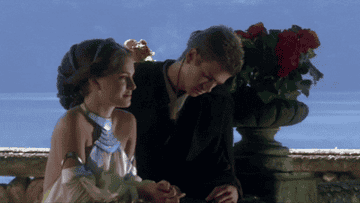 Natalie Portman and Hayden Christensen in a scene from &quot;Star Wars: Episode II – Attack of the Clones&quot; with text that says &quot;I don&#x27;t like sand&quot;
