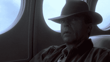 Aboard an airplane, Sam Neill is scared of a talking raptor