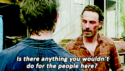 Two men facing each other, with one asking, &quot;Is there anything you wouldn’t do for the people here?&quot;