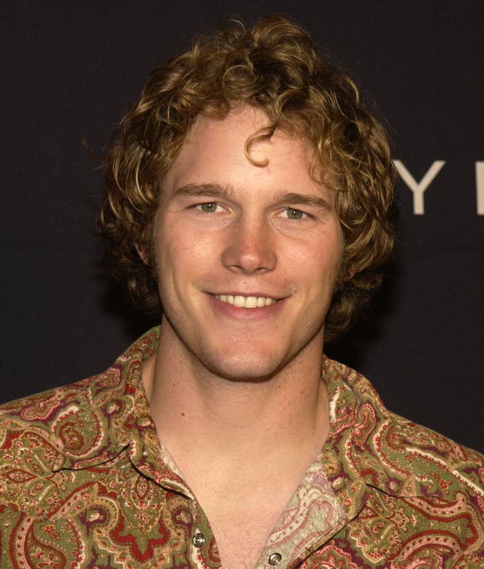 Chris Pratt  with curly hair in a patterned shirt