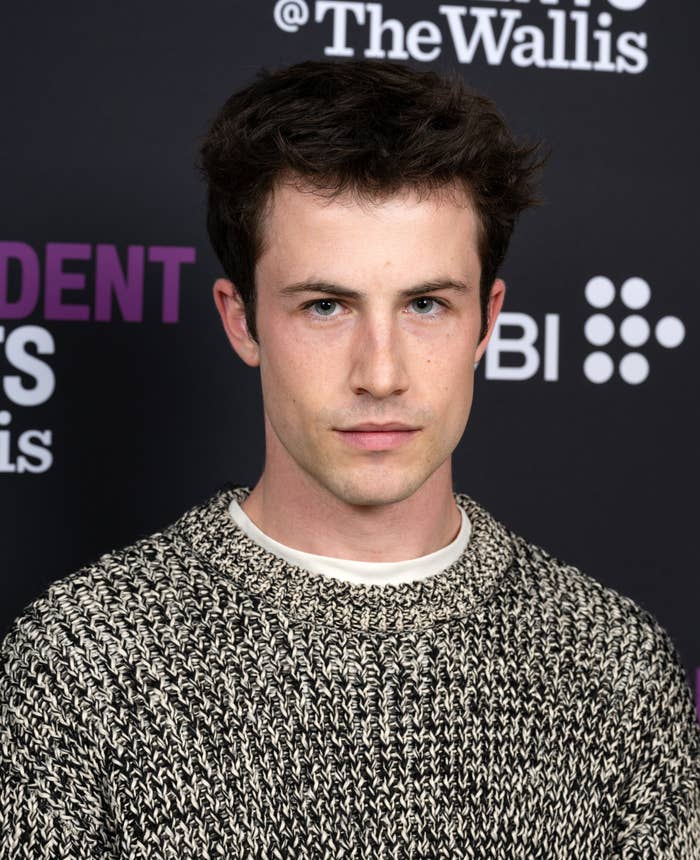 Dylan Minnette poses on the red carpet in a textured knit sweater at the Wallis Annenberg Center for the Performing Arts event
