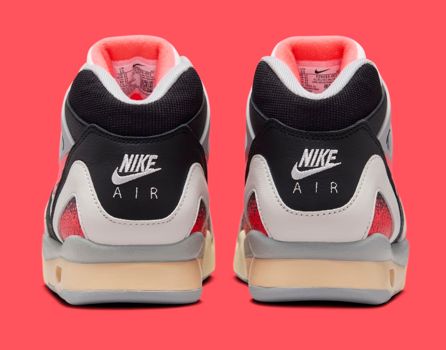 Back view of Nike Air sneakers with visible branded logos. The sneakers feature a high-top design with a mix of materials