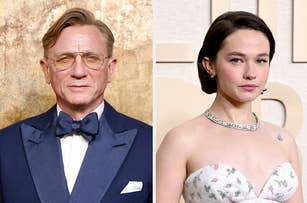 Daniel Craig in a blue suit with a bow tie and Emilia Clarke in a strapless dress with floral patterns pose for photos