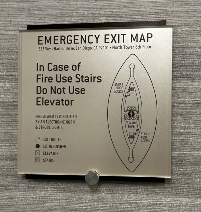 Emergency exit map for 333 West Harbor Drive, San Diego, CA 92101, North Tower 8th Floor. Shows exit routes via stairs and locations of fire alarm, extinguisher, and elevator