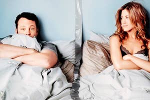 Vince Vaughn and Jennifer Aniston in bed with a duct tape barrier between them. He looks serious and cozy under the covers, while she wears a lingerie top, glancing at him
