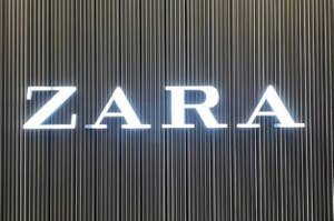 ZARA store logo on a vertical striped background