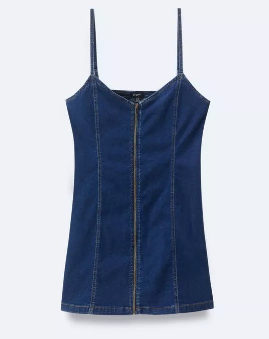 Denim tank top with thin straps and a zipper front on a plain background