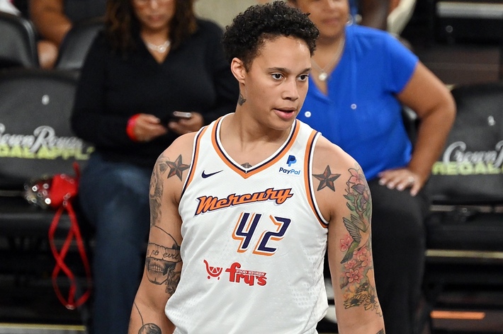 Brittney Griner in a basketball uniform, on the court during a game