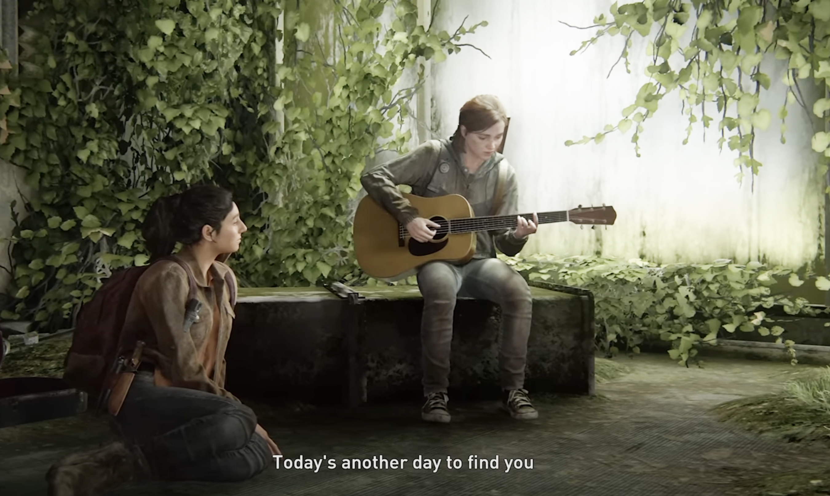 Ellie plays guitar while Dina listens in a scene from the video game The Last of Us Part II