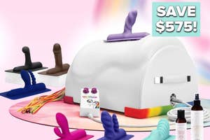 Unicorn-themed riding sex machine surrounded by dildo attachments, lube, and toy cleaner