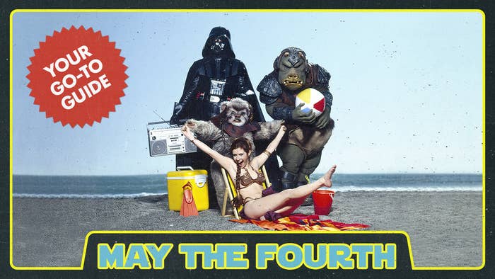 Person dressed as Princess Leia with characters Darth Vader, Chewbacca, and a Jawa on a beach with &quot;May the Fourth&quot; text