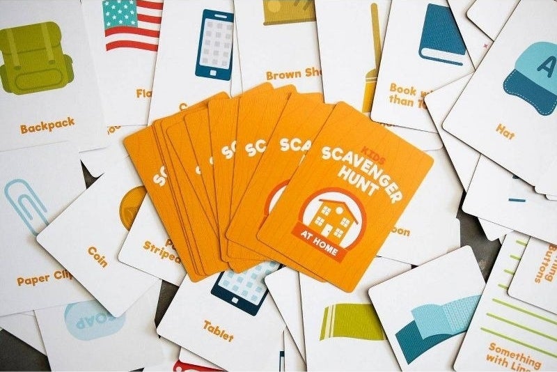 Assorted Scavenger Hunt game cards spread out on a surface
