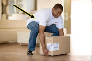 Man lifting a box with proper technique for health and safety