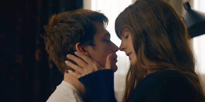 Nicholas Galitzine, Anne Hathaway share a close moment, one with a hand on the other&#x27;s cheek, in an intimate scene from The Idea of You