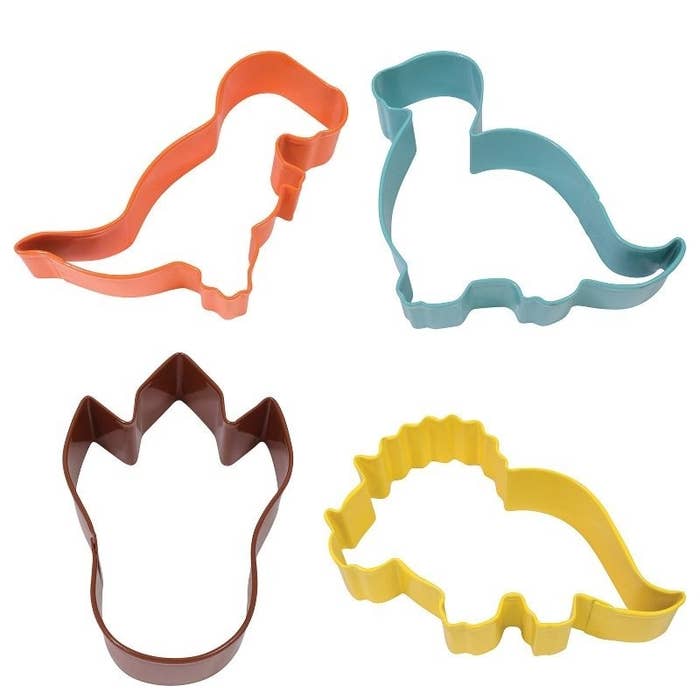 Set of four unique dinosaur-shaped cookie cutters for baking