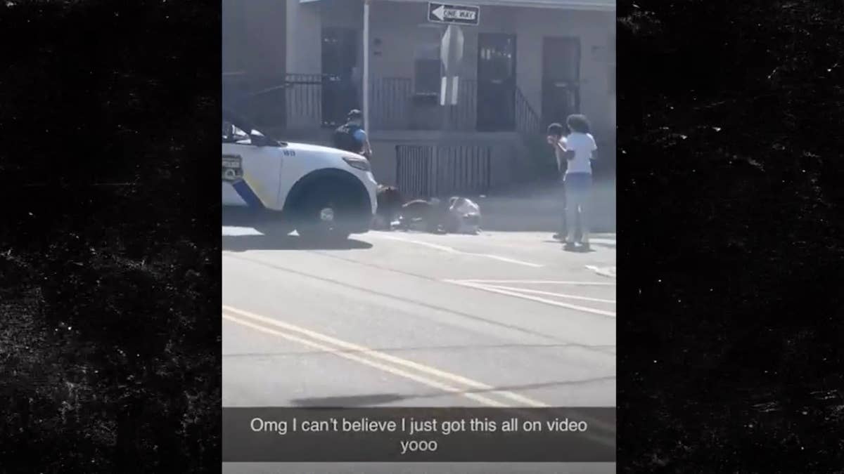 Graphic Video Shows Police Officer Shooting at Pack of Dogs as They Maul Man in Philadelphia