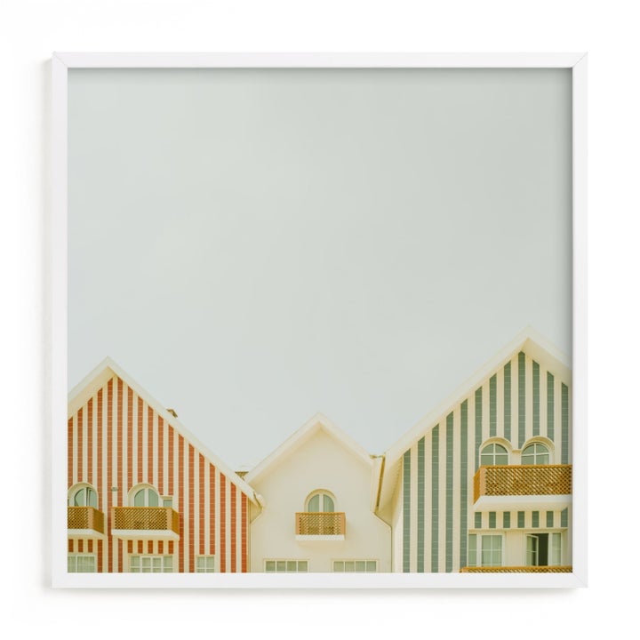 Wall art featuring stylized houses with striped patterns, suitable for home decor