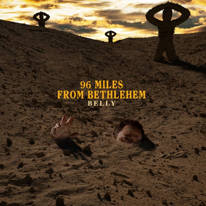 Cover art for Belly&#x27;s music album &quot;96 Miles from Bethlehem&quot; depicting a surreal desert scene with partially buried figures and distant silhouettes against an evening sky