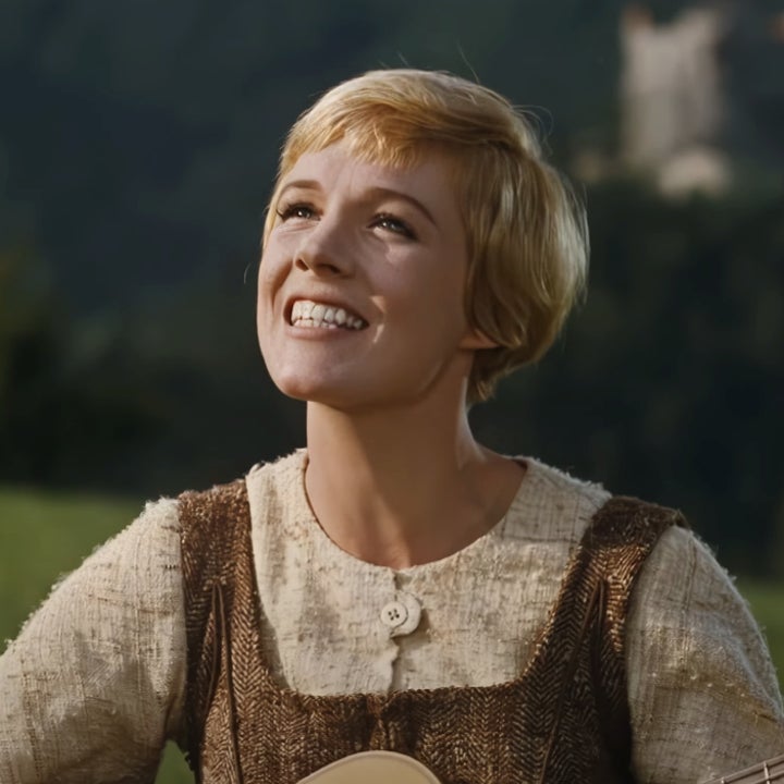 Julie Andrews as Maria sings outdoors while playing guitar in a scene from "The Sound of Music"