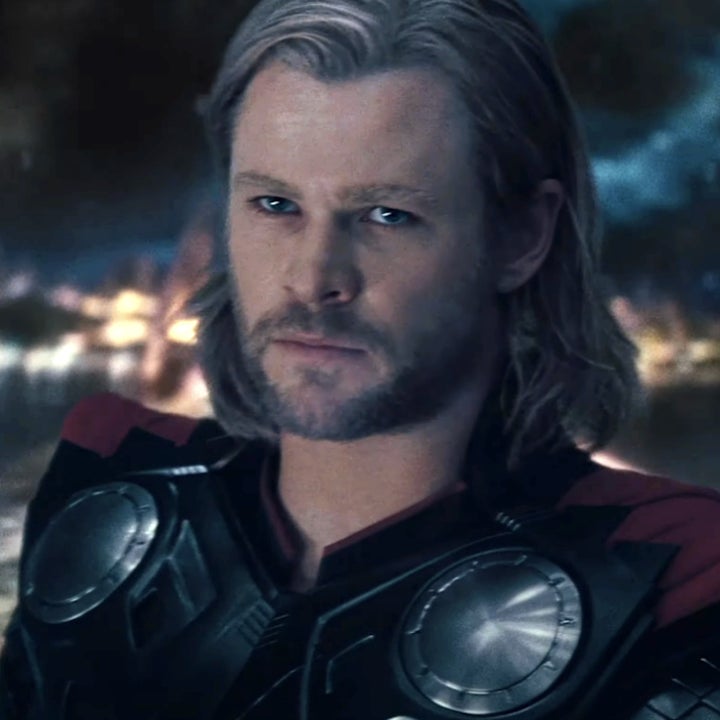 Chris Hemsworth as Thor in a scene from the movie. He is wearing his iconic armor with circular designs on the chest