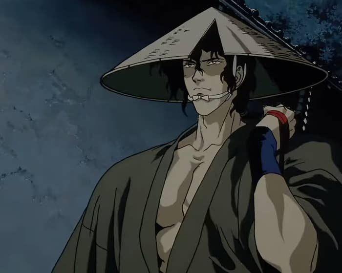 Kibagami Jubei walking through a town at night in his ronin attire