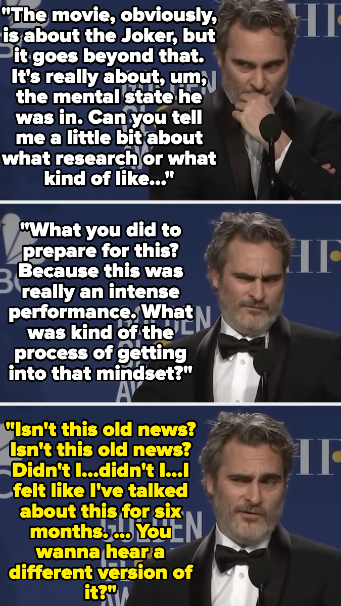 Joaquin Phoenix in a suit during an interview about his role in Joker, looking frustrated as he responds to a question about his research and mental state for the role