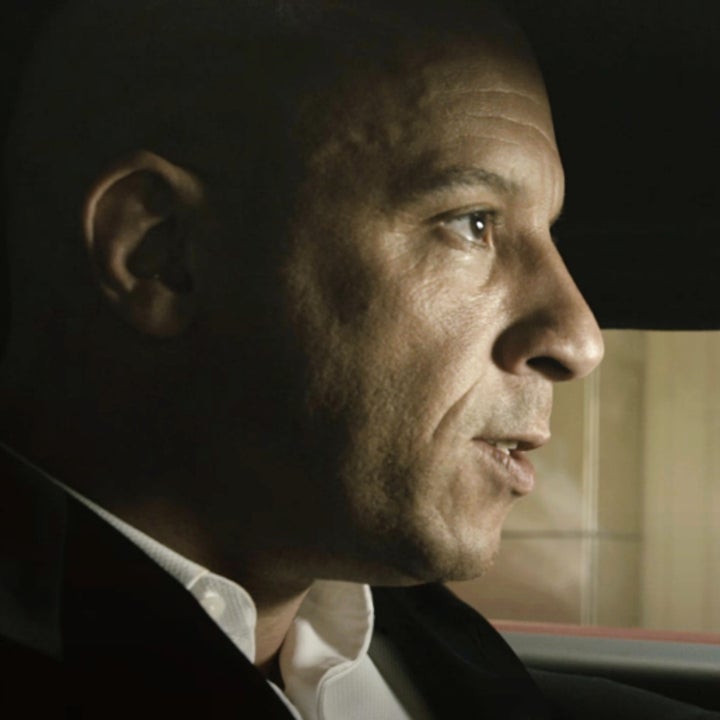 Vin Diesel is driving a car, looking intently ahead