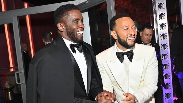Sean &quot;Diddy&quot; Combs and John Legend share a laugh at a formal event, both dressed in tuxedos with bow ties