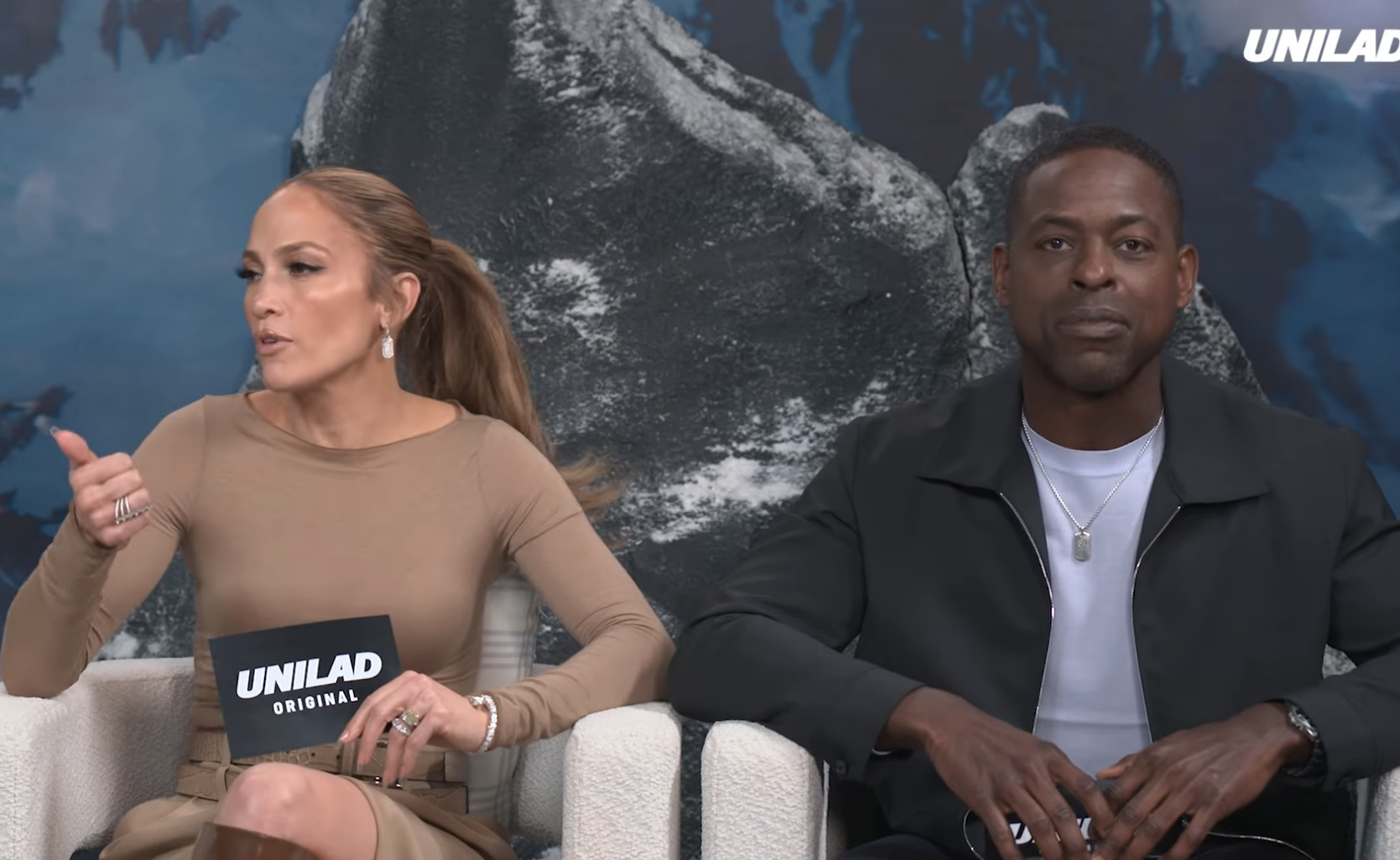 Jennifer Lopez, Simu Liu, and Sterling K. Brown discuss artificial intelligence fears on a UNILAD video for "In The Vault."