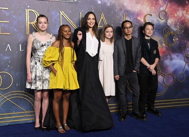 Angelina Jolie and her children attend the premiere of &quot;Eternals.&quot; Jolie wears a long gown