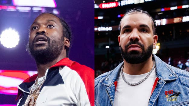 Meek Mill in a sporty jacket and Drake in a denim jacket with a chain necklace at an event