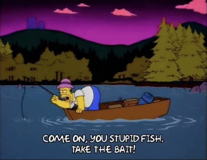 Animated scene from The Simpsons: Homer Simpson fishing from a boat, exclaiming, &quot;COME ON, YOU STUPID FISH. TAKE THE BAIT!&quot;