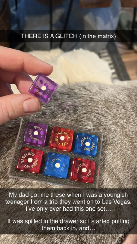 A hand holding a purple die above a set of colorful dice labeled "Fabulous Las Vegas" with the text: "My dad got me these when I was a youngish teenager … started putting them back in, and…"