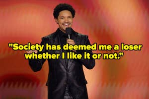Trevor Noah in a sparkling jacket performs stand-up with a quote from his act on screen