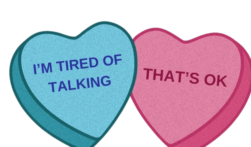 Two heart-shaped candies with phrases &quot;I&#x27;m tired of talking&quot; and &quot;That&#x27;s OK&quot;