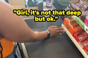 Person leaning on a checkout counter next to candy displays, highlighting casual interaction