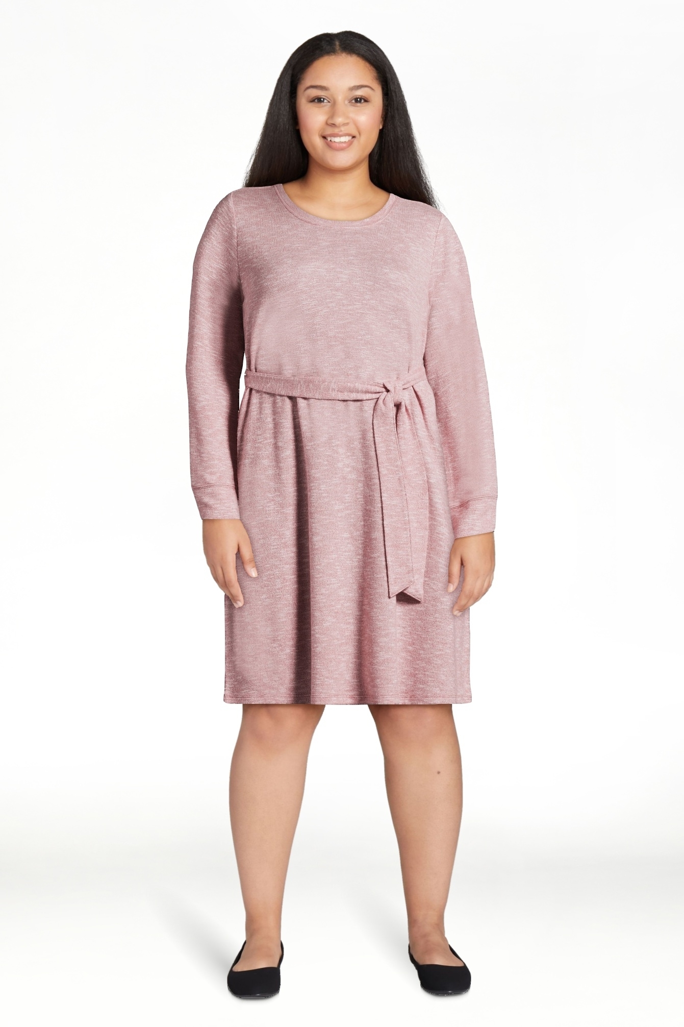 Person standing in a pink dress with a waist tie and long sleeves, suitable for a shopping category