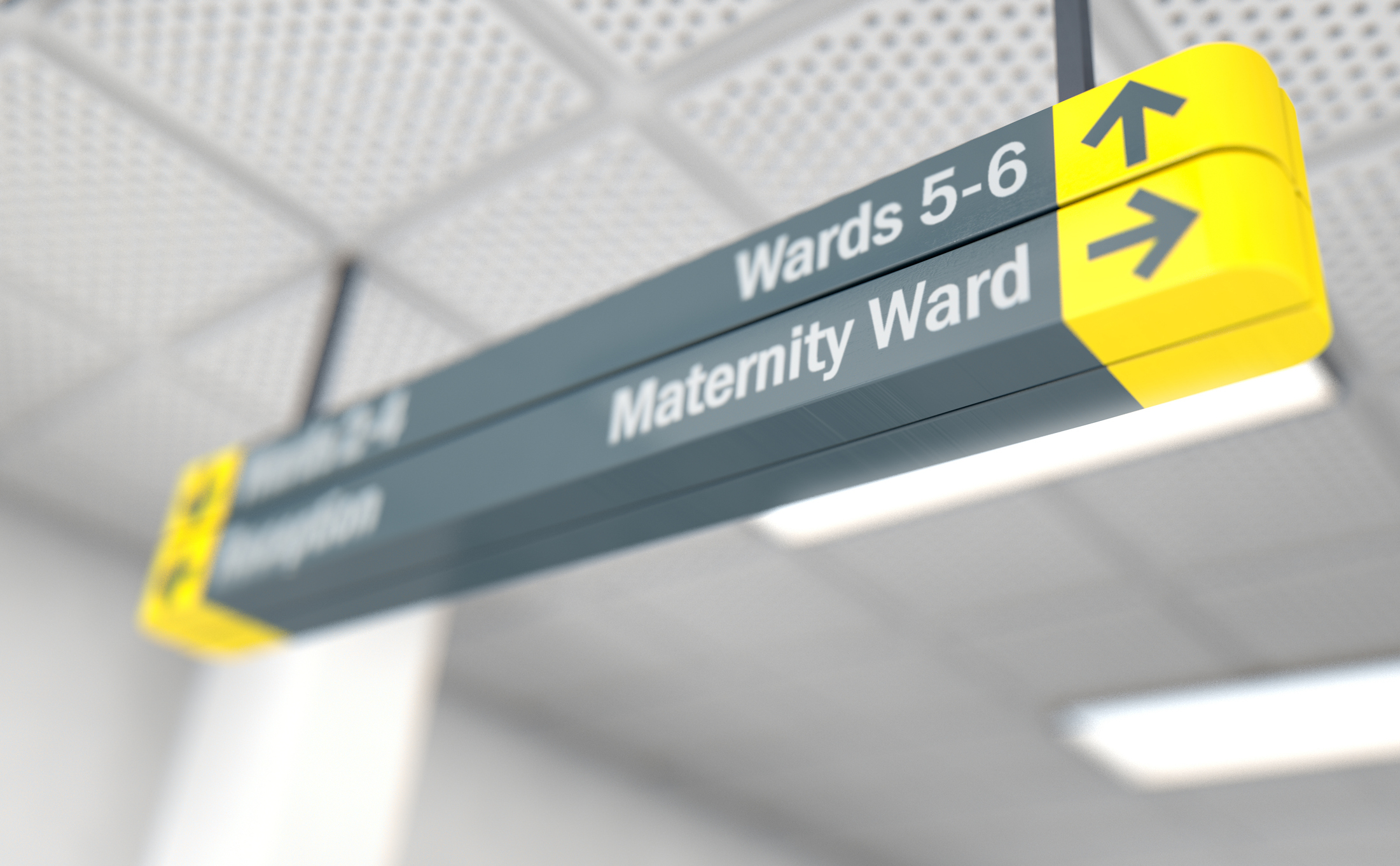 Hospital signage pointing to Wards 5-6, Maternity Ward with arrow indicators