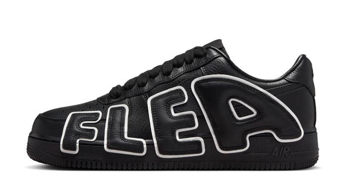 Black sneaker with the word &quot;FLEA&quot; on the side in raised letters and &quot;AIR&quot; on the rubber sole